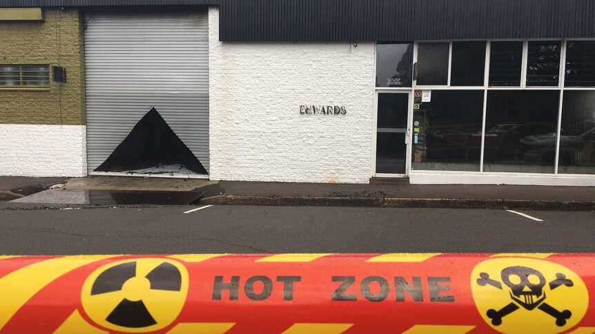 Hot zone warning tape outside the fire damaged Edwards bar in Newcastle West.