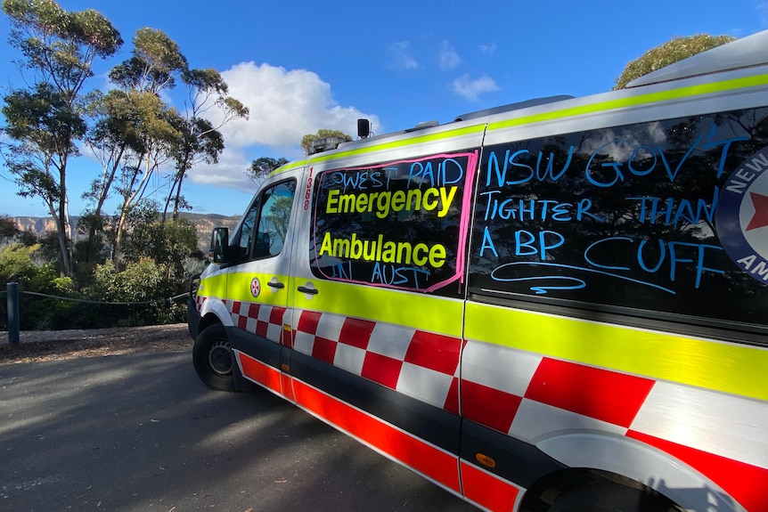 Protest signs on ambulances Supplied by the Australian Paramedics Association NSW