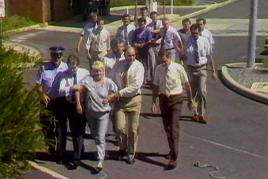 Police arrest Valmae Beck and Barrie Watts