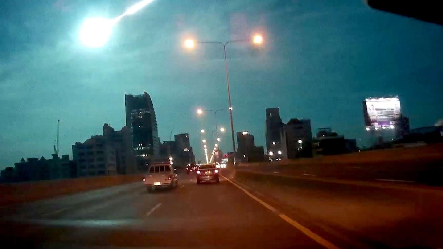 A suspected meteor steaks across the sky
