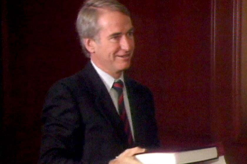 Tony Fitzgerald QC hands his report to the Queensland Government
