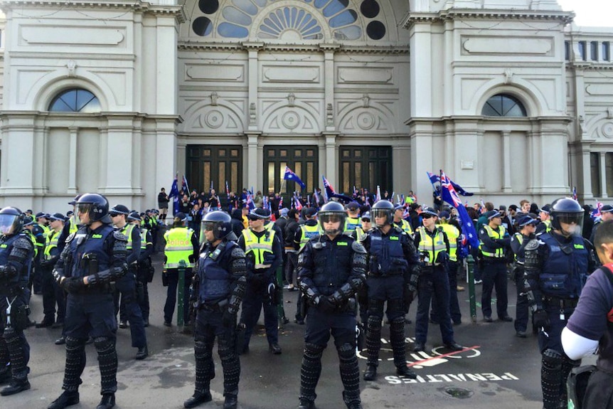 Police cordon off anti-immigration protesters in Melbourne