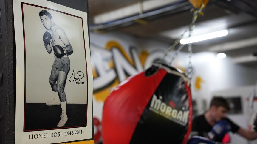 A poster of Indigenous boxer Lionel Rose on the wall of a gym.