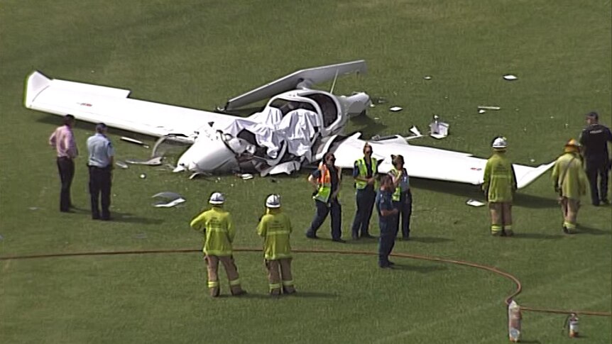 Emergency crews at the scene of a plane crash near Jimboomba.