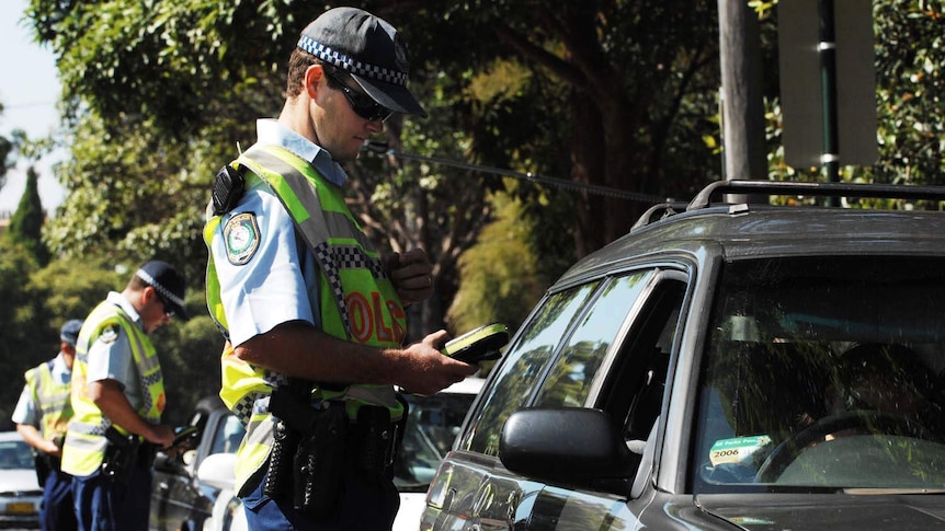 NSW police carry out random breath tests for drivers' blood alcohol levels in Sydney.