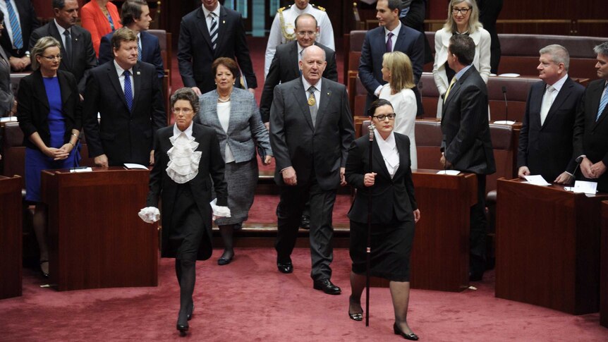 Governor-General Peter Cosgrove arrives in the Senate chamber at Parliament House for his swearing in.