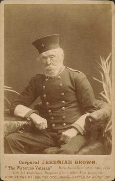A black and white photo of an elderly man in uniform.