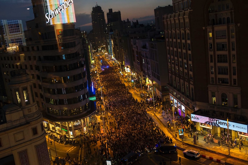 Thousands march along main Gran Via avenue during a protest in Madrid.