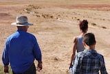 George Gorringe and his family look down on one of the stone circles found in Queensland's remote channel country.