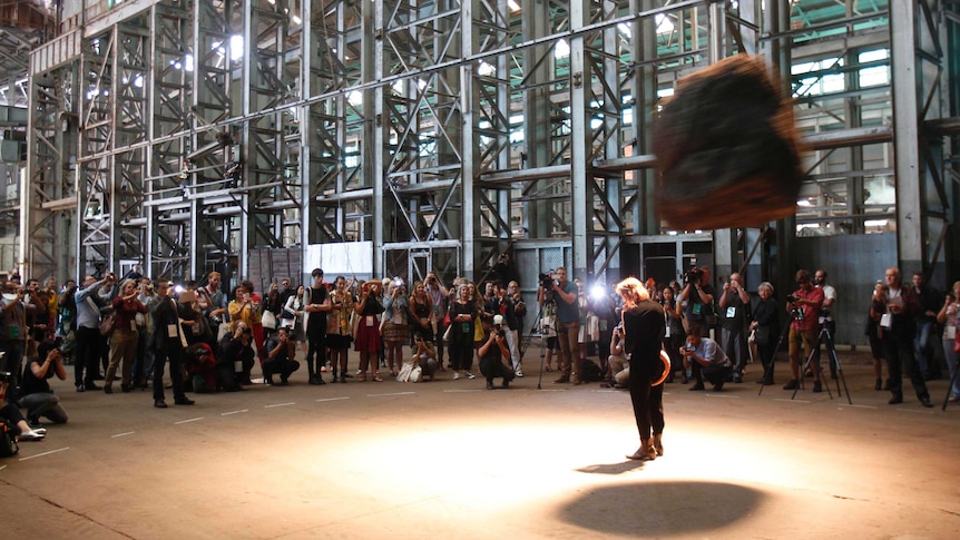 Tori Wranes performs her piece during at the 19th Biennale of Sydney on Cockatoo Island.