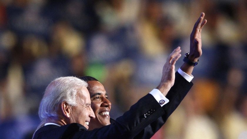 Joe Biden and Barack Obama wave to crowd
