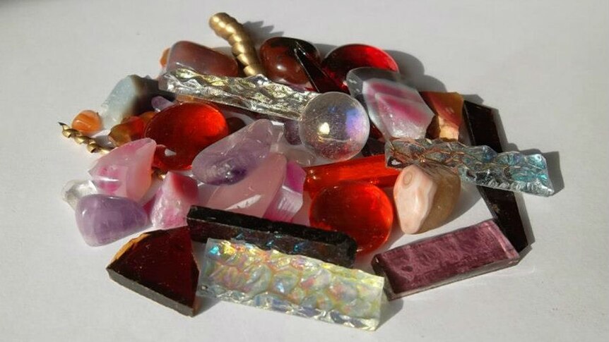 Picture of a colourful pile of gems and glass.