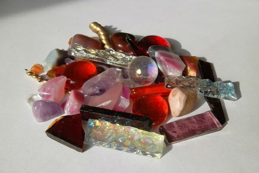 Picture of a colourful pile of gems and glass.