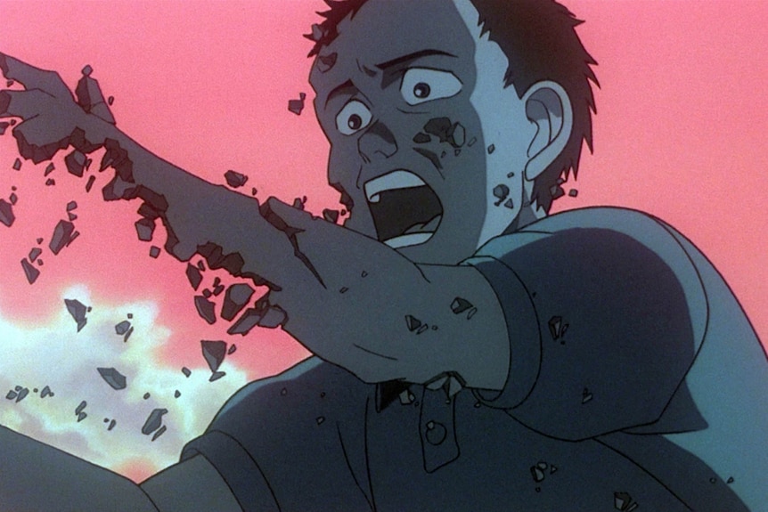 A screenshot of a man disintegrating in the film Akira.