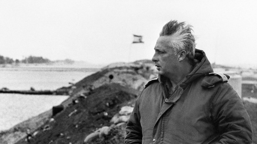 Israeli general Ariel Sharon stands on the right bank of the Suez Canal a few days before he left the army.