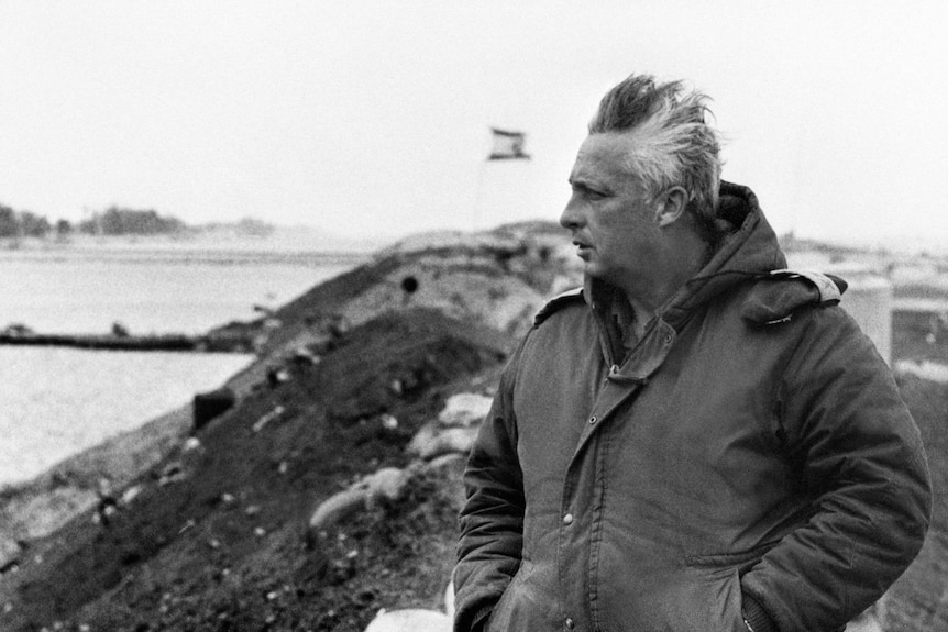 Israeli general Ariel Sharon stands on the right bank of the Suez Canal a few days before he left the army.
