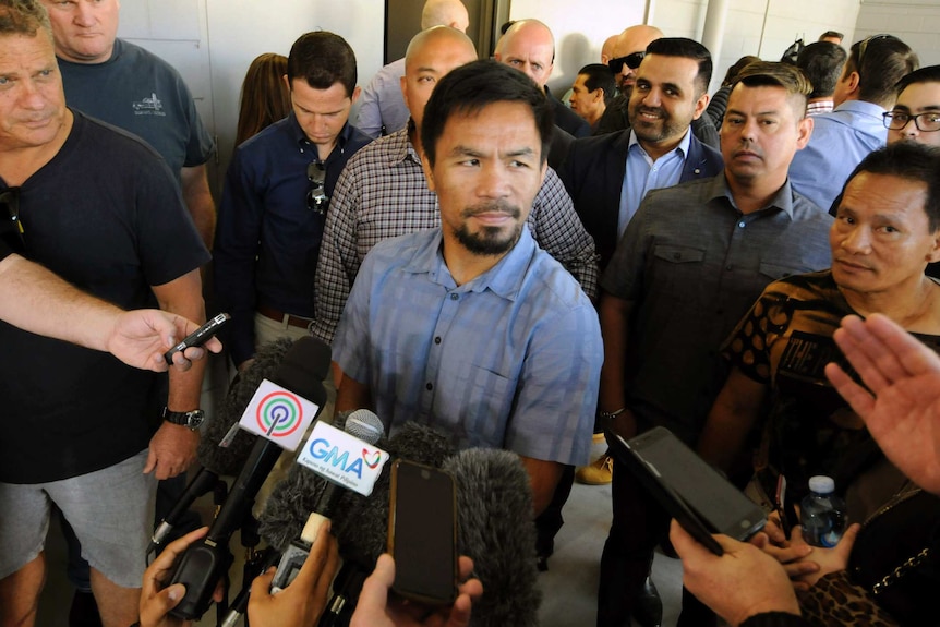 Boxer Manny Pacquiao leaves Worship Centre Christian Church in Carina. Brisbane