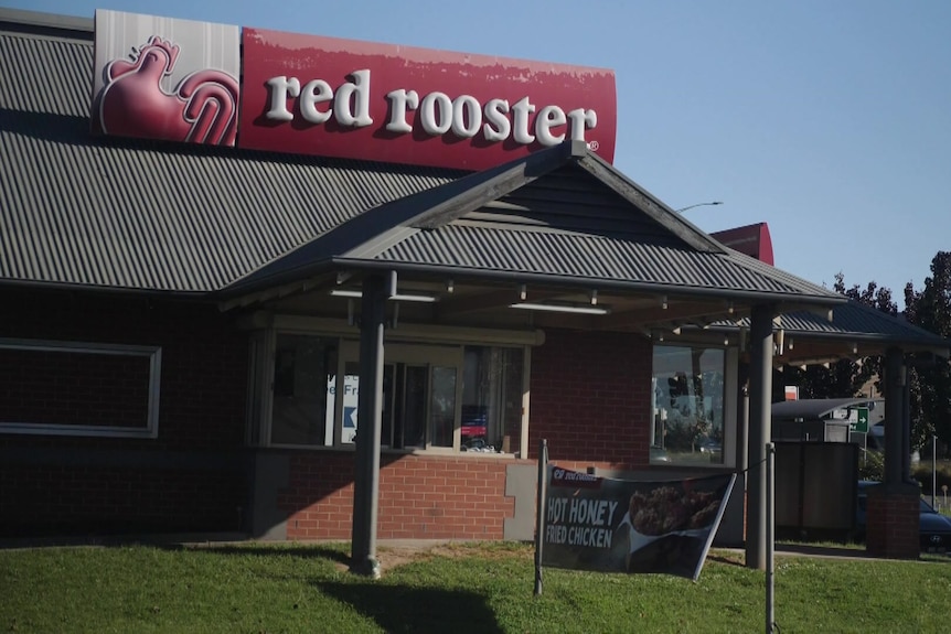 Exterior of a Red Rooster restaurant.