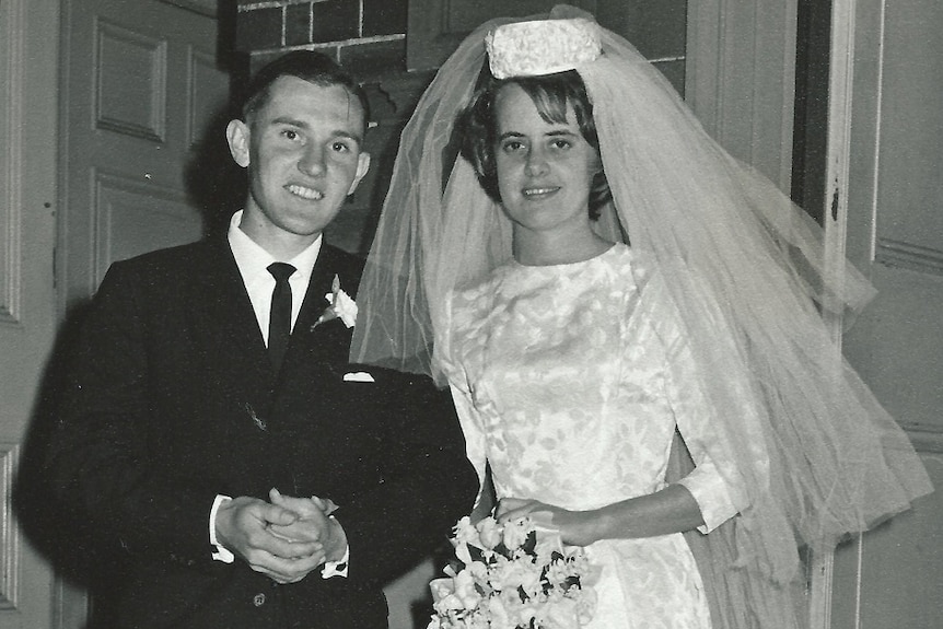 A young man and woman pictured in their wedding finery from 1965