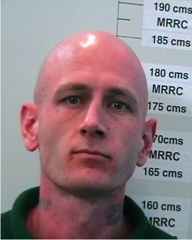 Manhunt on after convicted killer escapes custody - ABC News