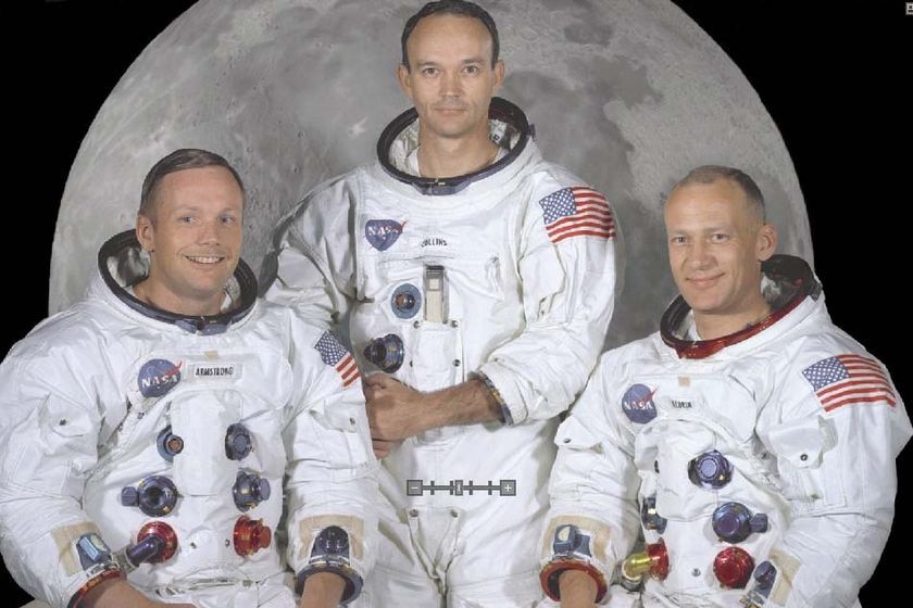The crew of the Apollo 11 mission Neil Armstrong, Michael Collins and Buzz Aldrin posing for a photo.