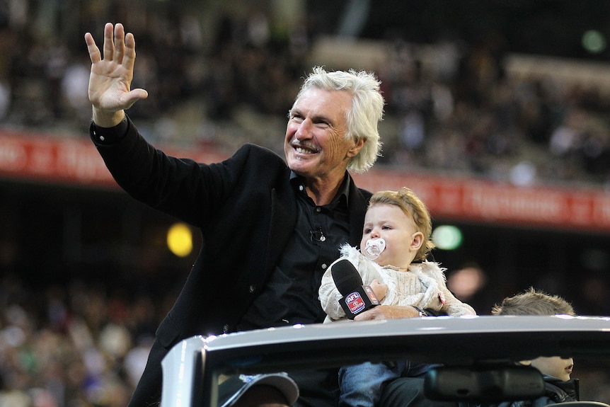 Mick Malthouse does a lap of honour