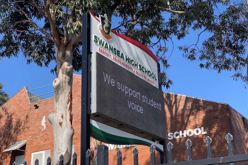 The sign outside Swansea High School reads: 'We support student voice'.
