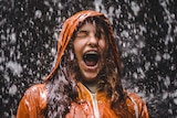 Girl screams while being drenched in rain