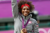 Serena Williams holds her gold medal