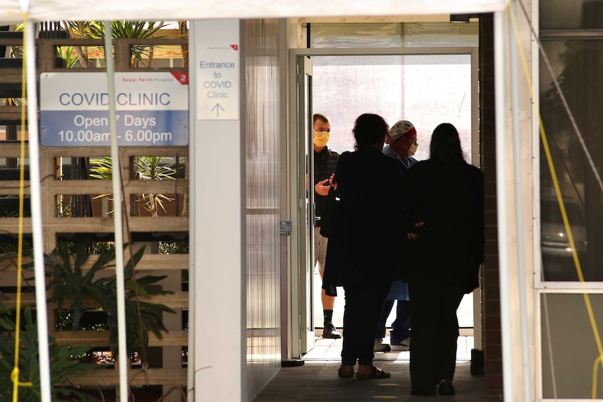 People queue to get tested at the Royal Perth COVID clinic on Murray Street.