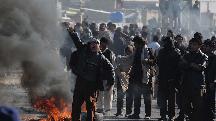 An Afghan youth shouts anti-US slogans as anger erupted in Kabul after NATO troops burnt Korans. (AFP: Shah Marai)
