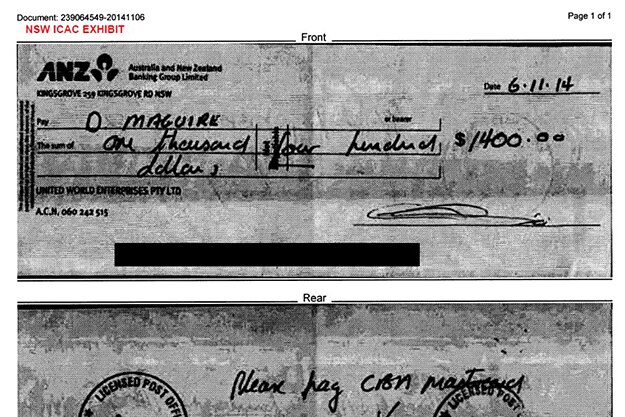 Black and white photocopy of two sides of bank cheque.
