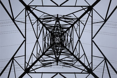 An electricity pylon carries power from a nuclear power station in the UK