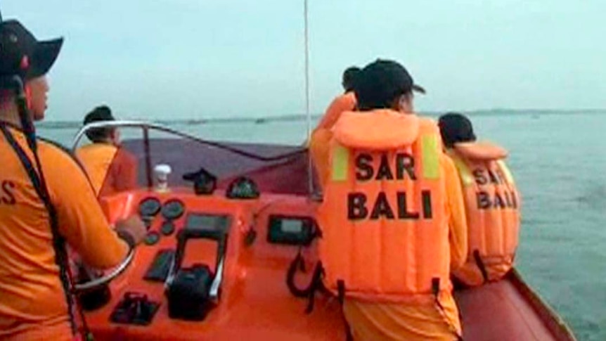 VIDEO STILL of rescue team searching for missing Japanese divers