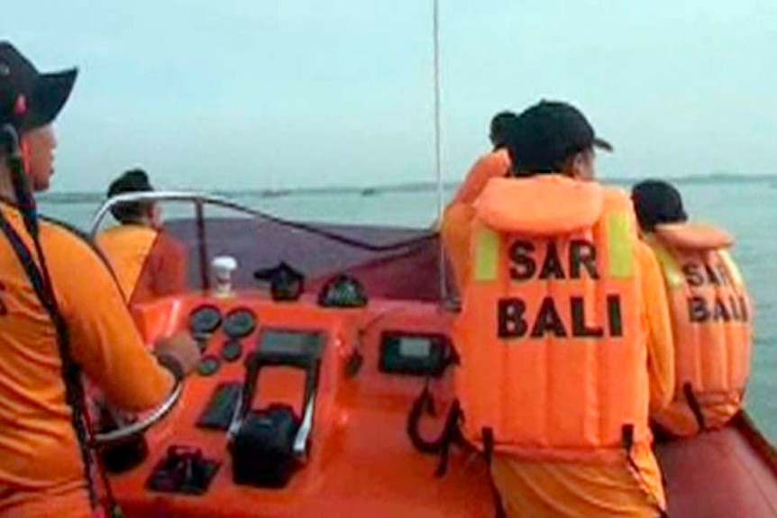 VIDEO STILL of rescue team searching for missing Japanese divers