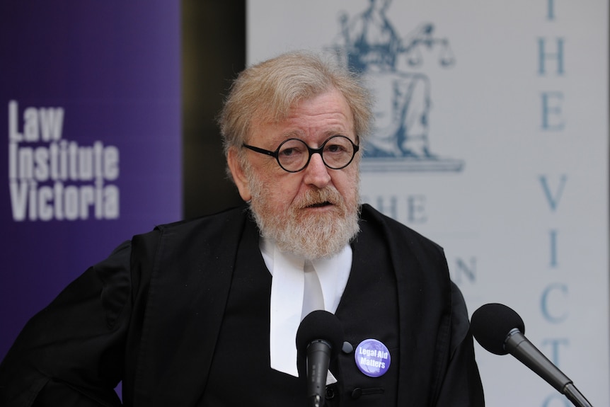 Robert Richter QC speaks at a rally outside the County Court in Melbourne