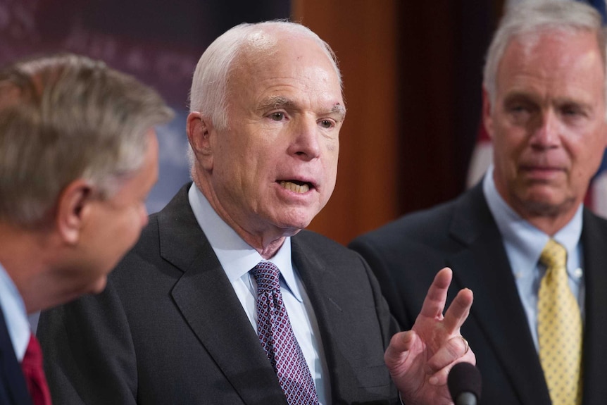 Lindsey Graham, John McCain and Ron Johnson speak to reporters about their resistance to the appeal of the affordable care act.