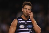 Geelong's Jimmy Bartel will miss two matches for striking Gold Coast's Trent McKenzie.