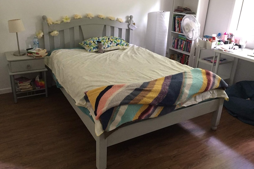 A young girl's bedroom that's been furnished entirely by donations.