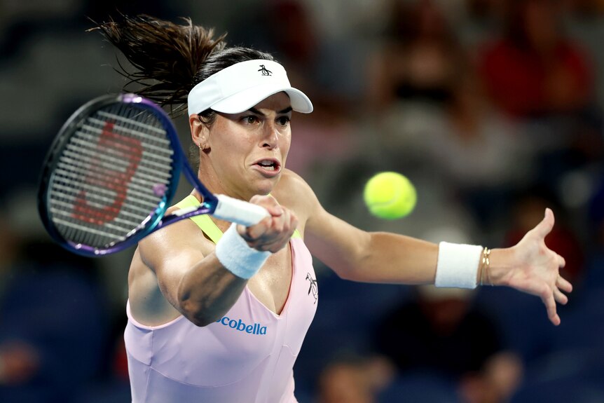  Ajla Tomljanovic plays a forehand at the Australian Open.
