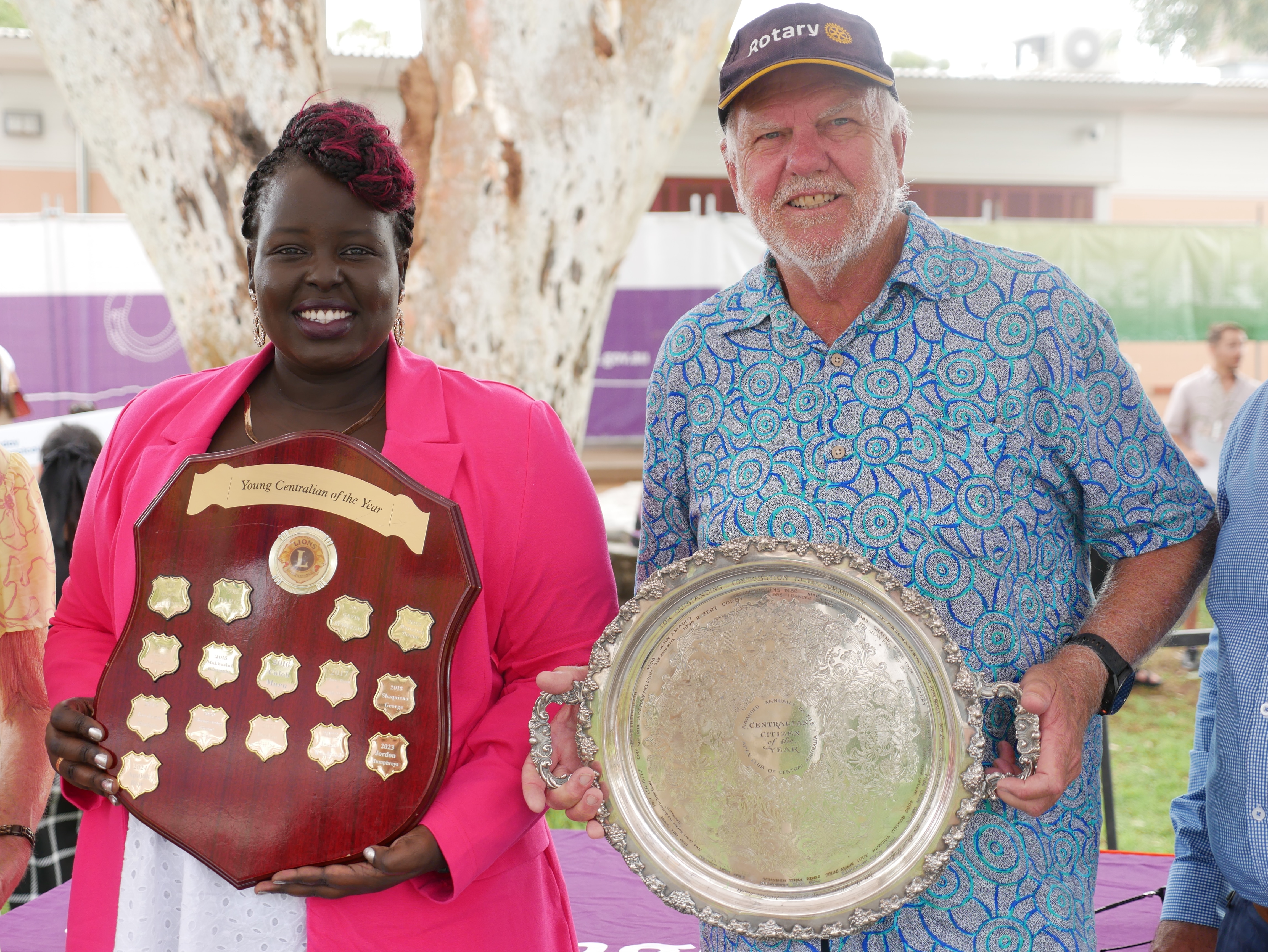Two people receive awards