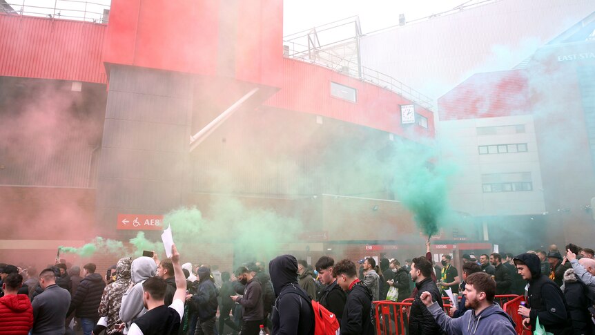 Fans use flares outside Old Trafford 