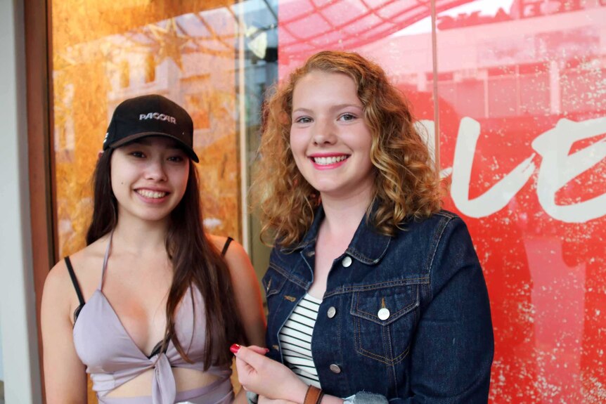 Two Hobart women smile after Boxing Day shopping