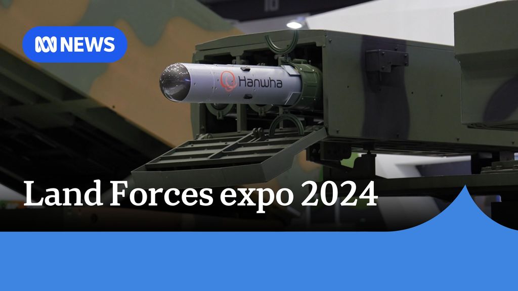 Land Forces expo 2024: A missile launching system on display with a missile poking out.