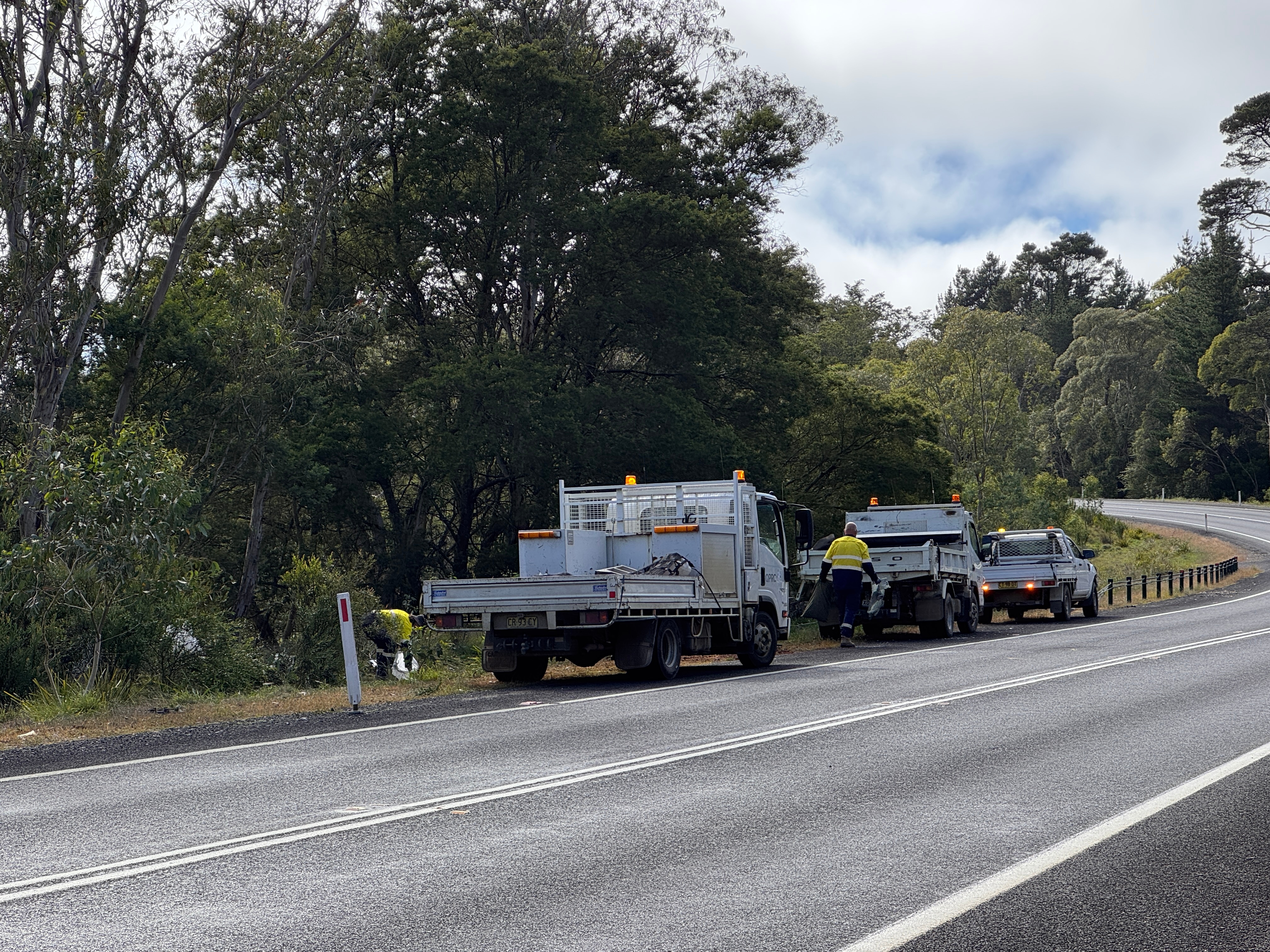 trucks on the side of the road