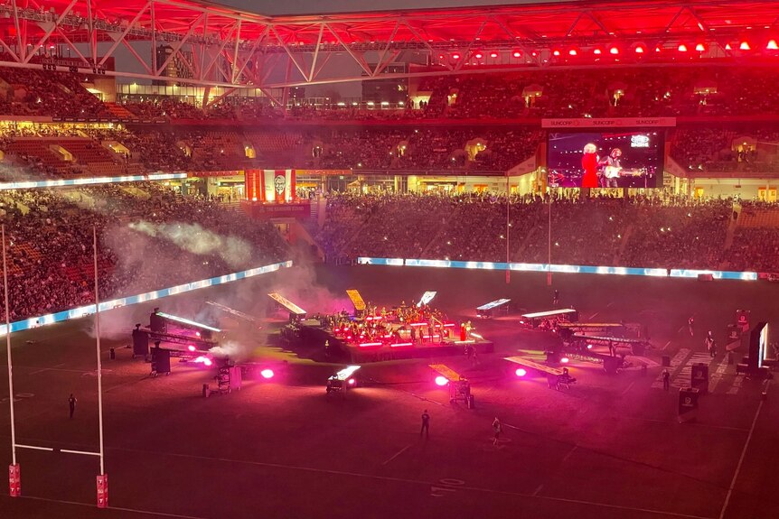 There was plenty of light and colour in the pre-game entertainment at Lang Park before the start of the 2021 NRL grand final.