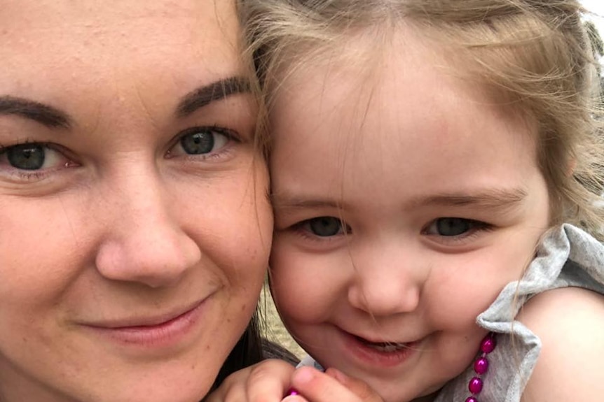 Emily and Charlotte smile in a closeup selfie.