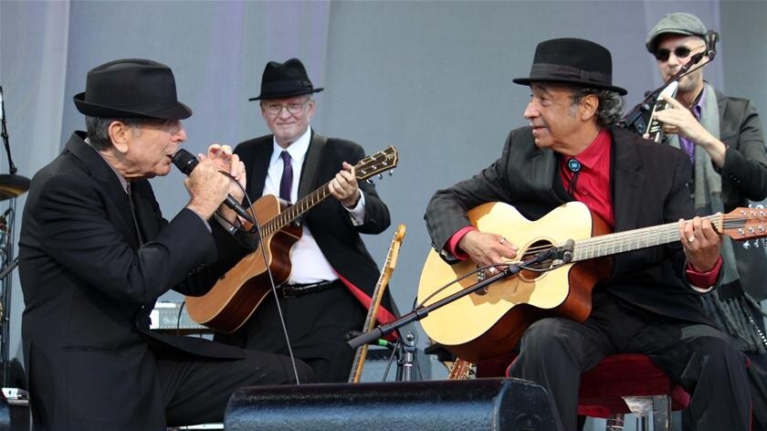 Leonard Cohen sings to his guitarist