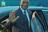 Jacob Zuma waves his hand.