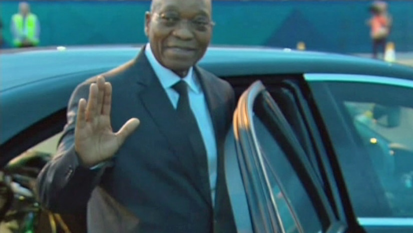 Jacob Zuma waves his hand.